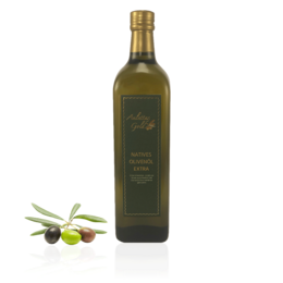 Extra virgin olive oil, 1 liter, harvest 2021. Bottle of olive oil with olives and olive leaves on a stone background.