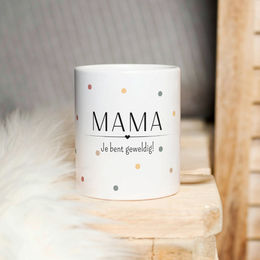 Boho-style mug with affirmation text "never stop dreaming" and floral print design. Ceramic material, suitable for hot beverages.