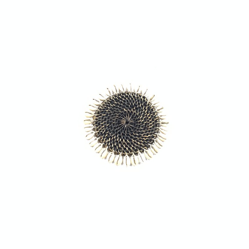 Rattan coaster with cowrie shells