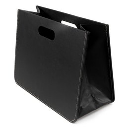 Black folding magazine rack made of imitation leather. Rectangular shape with handles for easy carrying.