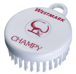 A white plastic dish brush with a red logo and text "WESTMARK CHAMPY" on it. The brush has a round shape with bristles on the surface.