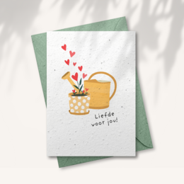Tarjeta de felicitación de papel en crecimiento - Planta de corazón