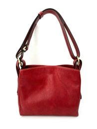 Red leather shoulder bag, structured square shape, burgundy handles, crossbody style, everyday bag