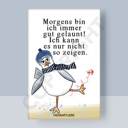 A round, white ceramic magnet with a playful illustration of a bird and the text "Morgens bin ich immer gut gelaunt! Ich kann es nur nicht so zeigen."