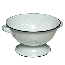 Enamel sieve, a decorative white enamel colander with perforated holes, suitable for straining or displaying.