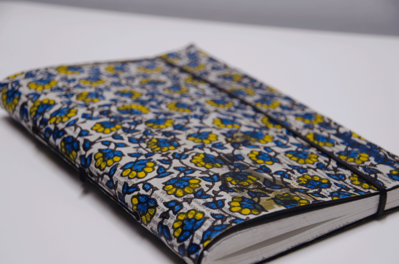 YLANG-YLANG NOTEBOOK IN AIR CHAMBER AND PRINTED NEWSPAPERS