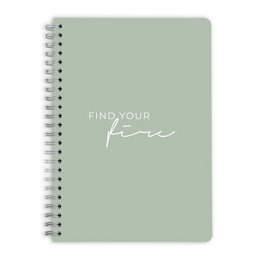 A mint green spiral-bound notebook with the text "Find Your Fire" printed on the cover.