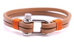 Cognac leather woven bracelet with silver-tone anchor clasp and orange accents.