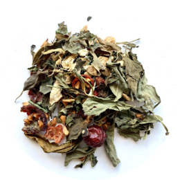 Loose leaf tea with a blend of dried herbs, flowers, and fruits. Earthy, floral, and slightly sweet flavor profile.