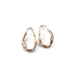 Sculptural bronze stud earrings with organic texture, featuring a unique twisted design.