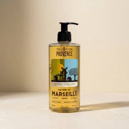 Golden liquid Marseille soap, olive oil-based, pump dispenser bottle, natural skincare product.