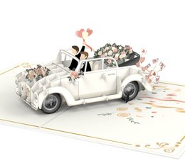 Trouwauto met pop-upkaart voor homoparen