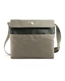 Khaki messenger bag made of durable tent fabric with a flap closure and adjustable shoulder strap.