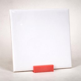 Rectangular oak wood tile holder with natural wood grain texture.