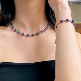 Set di gioielli incantati con ametista e onice verde