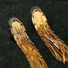 Pendientes largos con borlas brillantes