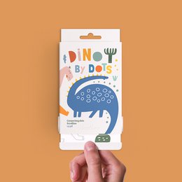 Coloring book and dot-to-dot games featuring a dinosaur design. The product is part of the Scrollino DINO by Dots collection and is available in French and English versions.