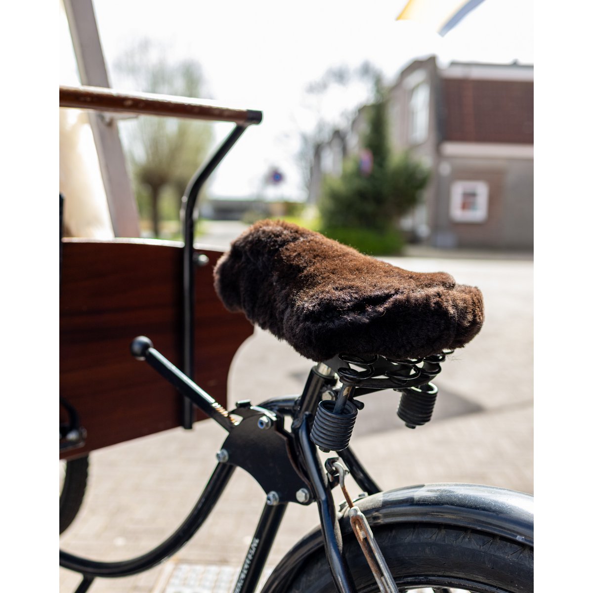 Coprisella per bicicletta in pelle di pecora | 4 colori