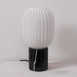 Prosta lampa stołowa kapsułki
