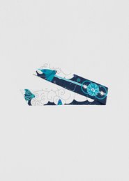 Teal and white patterned woven scarf with a butterfly motif.