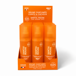 Orange spray bottle, red sandalwood scent, body and hair mist, natural fragrance product.