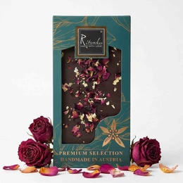 Premium dark chocolate bar with gold and rose colored flecks, handmade in Austria.