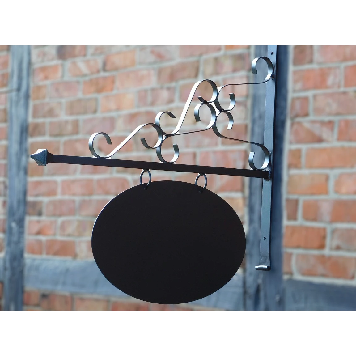 Iron shop sign – black powder-coated – romantic – oval wall-mounted model
