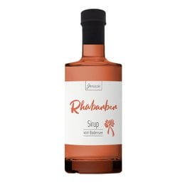 Organic rhubarb syrup in a glass bottle with a black cap. The label features the product name "Rhubarb" and the word "Syrup" in red text.