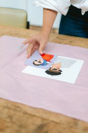 Vibrant poster featuring a whimsical illustration of a Parisian-inspired character. Suitable for wall decor in a variety of settings.