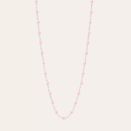  Pale pink resin necklace with delicate beads and chain.