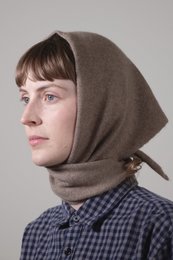 Soft, warm cashmere scarf in a classic triangle shape. Available in a range of neutral colors to complement any outfit.