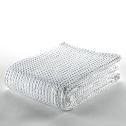 A white woven quilt measuring 105cm for a bed. The quilt has a textured, grid-like pattern and appears to be made of a soft, breathable material.