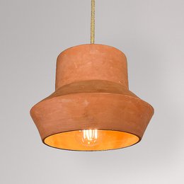 Terracotta pendant light with open design and perforated details, suitable for modern or rustic decor.