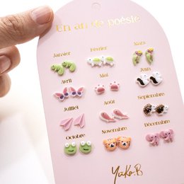 Box of 12 Steel Earrings — A Year of Jungle Poetry
