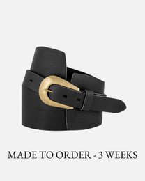 Wide waist belt with horseshoe buckle in black, brown, and cognac colors. Available in sizes XS-100. Features a classic style and durable leather construction.