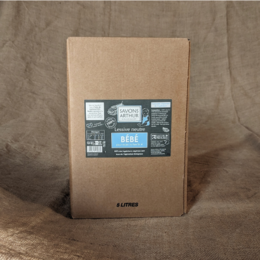 Organic baby detergent in 5L bib packaging. Cardboard box with blue label and text.