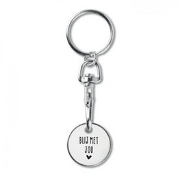 A silver-colored metal keychain with a round charm that says "BEST MET YOU" in black text.