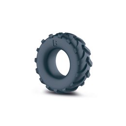 Grey, textured, ring-shaped product for intimate use. Made of durable material, designed for comfort and pleasure.
