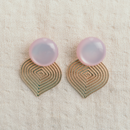 Statement earrings in multiple colors, featuring a geometric gold-tone design with a pink stone accent.