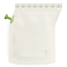 "White cylindrical tea brewer with green handle, empty infuser pouch, minimalist design"