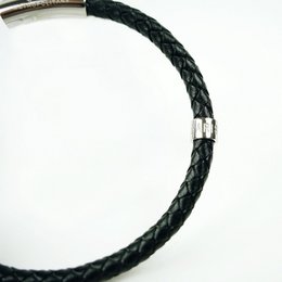 Black braided leather charm bracelet with silver-tone clasp, available in sizes M, L, and S.