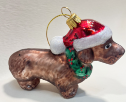 Dachshund dog Christmas ornament, brown, Santa hat, festive holiday decoration.