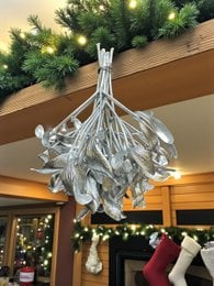 Metallic silver mistletoe ornament bundles, perfect for Christmas decor. Includes 8 packs of 3 bundles each, with a shimmering, natural appearance.