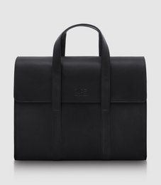Midnight black briefcase with sleek, minimalist design. Made of durable, high-quality material. Suitable for carrying laptops and other office essentials.