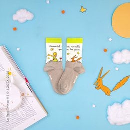 Gray children's socks with colorful animal prints and text. The socks appear to be made of a soft, comfortable material and are suitable for everyday wear.
