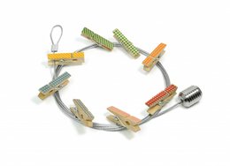 A decorative photo wire with 8 wooden clips in various colors, including green, orange, and gray. The clips are arranged in a circular shape, creating a unique and eye-catching display for photos or other small items.