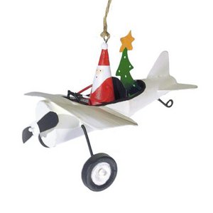Weihnachtsmann im Flugzeug mit Weihnachtsbaum