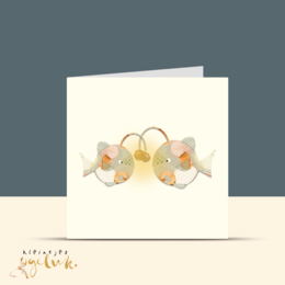 A greeting card with a simple, minimalist design featuring two interlocked rings and a heart-shaped motif in pastel colors. The card conveys a message of love and affection.