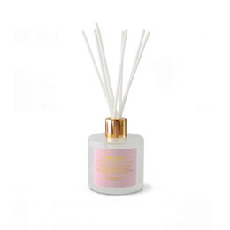 White cylindrical scented candle with gold lid, blue label, luxury home fragrance, aromatic decor.