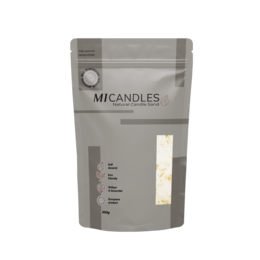  Tall, round, golden pillar candle made of wax with a textured surface.